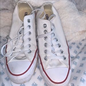 slightly worn white converse!